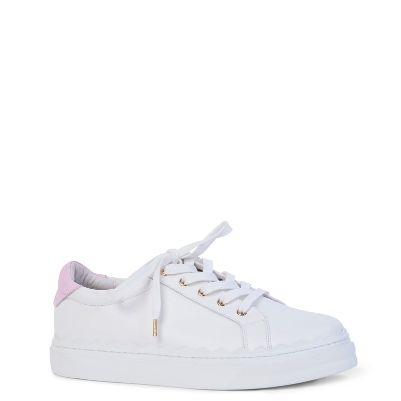 Chunky white sneaker with a pink heel tab